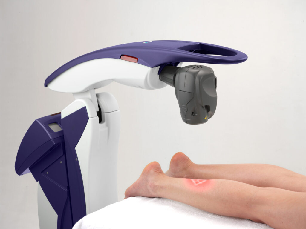 Robotic M6 MLS Therapy Laser Treating a Patient's Lower Leg